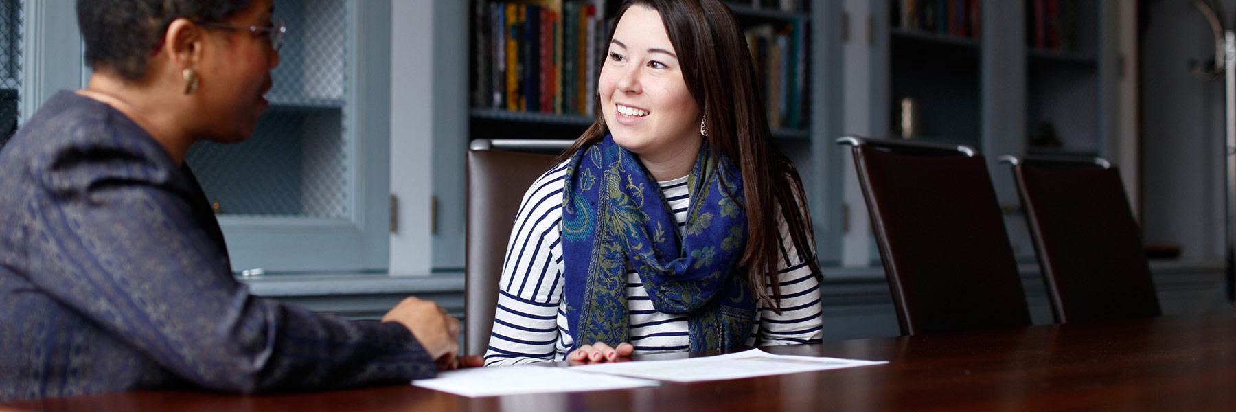 A student meets with an advisor.